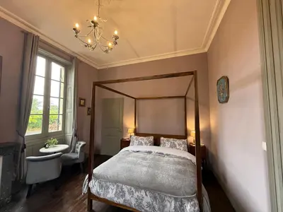 Un ou plusieurs lits dans un hébergement de l'établissement La Maison de Maître Chagnon Aumagne