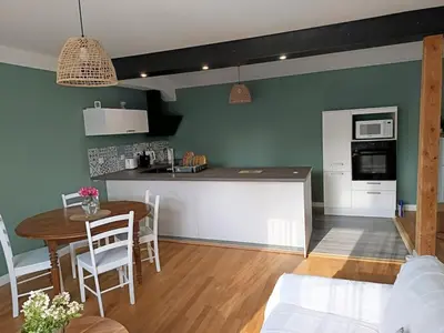 Cuisine ou kitchenette dans l'établissement Hébergement quartier historique