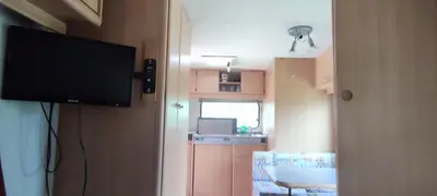 Cuisine ou kitchenette dans l'établissement Belle caravane au calme