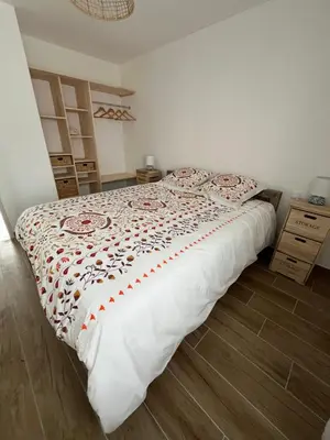 Un ou plusieurs lits dans un hébergement de l'établissement Maison neuve tout confort avec jardin