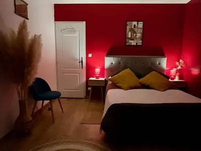 Un ou plusieurs lits dans un hébergement de l'établissement Chambre cosy dans maison familiale avec petit déjeuner chez Olivier et Manuel à Clavette, proche La Rochelle