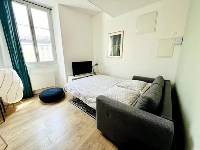 Coin salon dans l'établissement Le Ferte - Coeur de ville