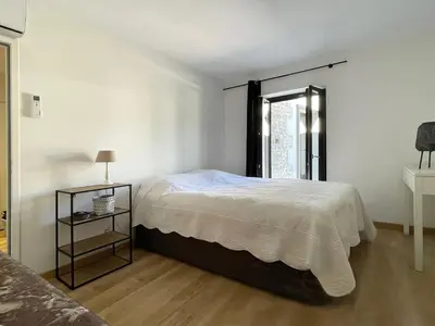 Un ou plusieurs lits dans un hébergement de l'établissement Maison de charme avec piscine, escapade, détente