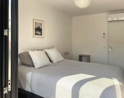 Un ou plusieurs lits dans un hébergement de l'établissement Maison de charme avec piscine, escapade, détente