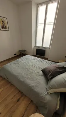 Un ou plusieurs lits dans un hébergement de l'établissement Maison élégante entre Ré et Marais