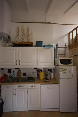 Cuisine ou kitchenette dans l'établissement Le refuge de la Fée - centre et plage