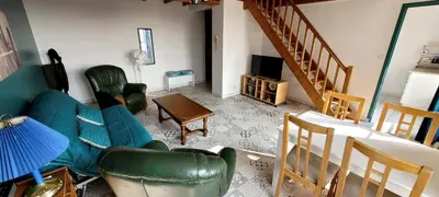 Coin salon dans l'établissement Le Duplex Charentais
