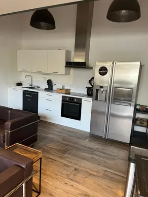 Cuisine ou kitchenette dans l'établissement Loft centre ville à saintes