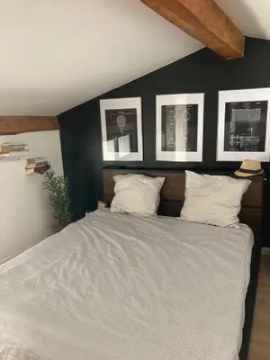 Un ou plusieurs lits dans un hébergement de l'établissement Loft centre ville à saintes
