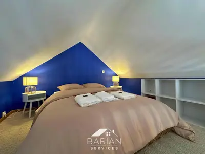 Un ou plusieurs lits dans un hébergement de l'établissement 7min de la plage - Maison typique - Cour privative