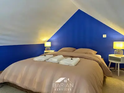 Un ou plusieurs lits dans un hébergement de l'établissement 7min de la plage - Maison typique - Cour privative