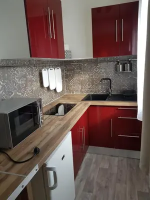 Cuisine ou kitchenette dans l'établissement Studio Beauséjour