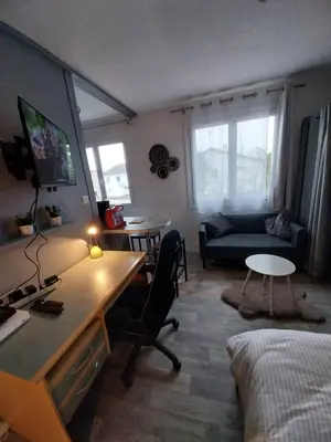 Télévision ou salle de divertissement dans l'établissement Studio Beauséjour