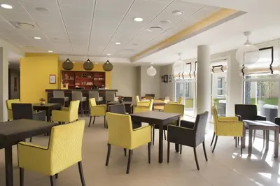 Restaurant ou autre lieu de restauration dans l'établissement Domitys La Clef des Champs