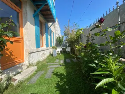 Jardin de l'établissement Maison en hyper centre, à 50 mètres de la plage