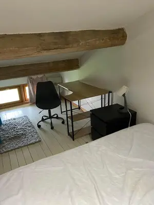 Un ou plusieurs lits dans un hébergement de l'établissement Maison calme en campagne
