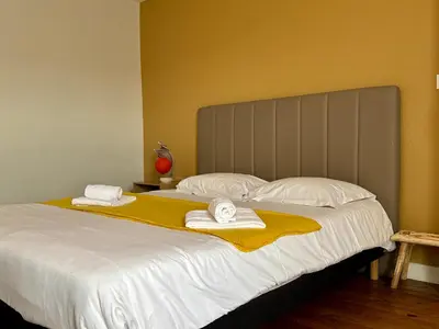 Un ou plusieurs lits dans un hébergement de l'établissement Gîte du Puits Olivier 10 personne chaleureux 3 étoiles