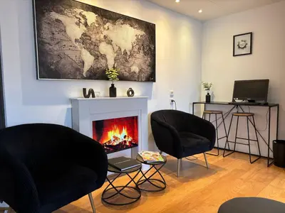 Télévision ou salle de divertissement dans l'établissement Les Apparts du Valois, Cognac Centre