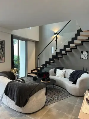 Coin salon dans l'établissement FOURAS villa Jean Michèle Villa Neuve en front de mer