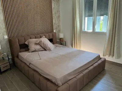 Un ou plusieurs lits dans un hébergement de l'établissement chambre d'hotes Les 3 moineaux