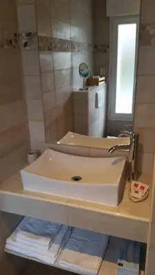 Salle de bains dans l'établissement Le Clos des Oiseaux