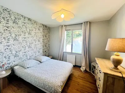 Un ou plusieurs lits dans un hébergement de l'établissement L'Aparté - Jardin privatif