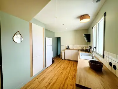 Cuisine ou kitchenette dans l'établissement L'Aparté - Jardin privatif