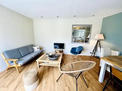 Coin salon dans l'établissement L'Aparté - Jardin privatif