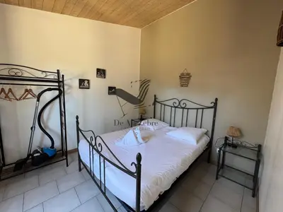 Un ou plusieurs lits dans un hébergement de l'établissement ARISTIDE 8 - Agréable maison idéalement située