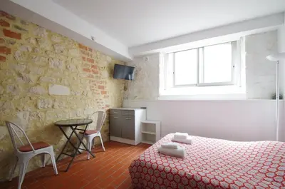 Un ou plusieurs lits dans un hébergement de l'établissement Sara, Wifi, Mignon, Discret
