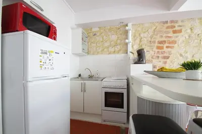 Cuisine ou kitchenette dans l'établissement Sara, Wifi, Mignon, Discret