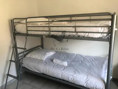 Un ou plusieurs lits dans un hébergement de l'établissement ARISTIDE 9 - Agréable maison idéalement située
