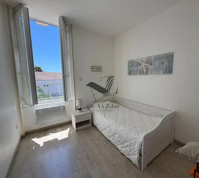 Un ou plusieurs lits dans un hébergement de l'établissement ARISTIDE 5 - Appartement idéalement situé
