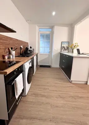 Cuisine ou kitchenette dans l'établissement Maison à 4 minutes du Futuroscope