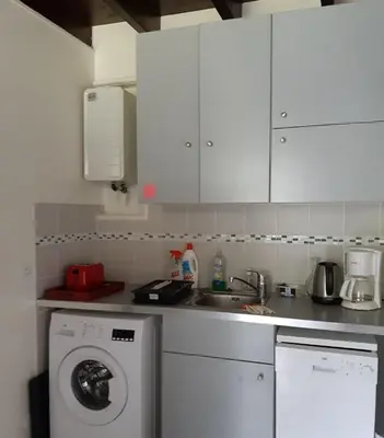 Cuisine ou kitchenette dans l'établissement Gite au calme