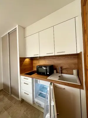 Cuisine ou kitchenette dans l'établissement Studio Escale Rochelaise