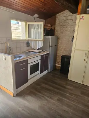 Cuisine ou kitchenette dans l'établissement Charmante vendéenne