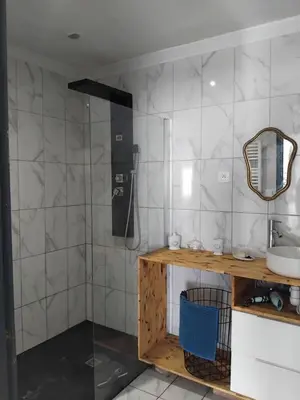 Cuisine ou kitchenette dans l'établissement Grand appartement