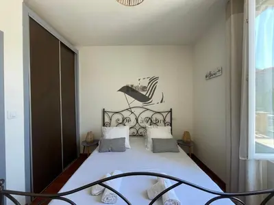 Un ou plusieurs lits dans un hébergement de l'établissement ARISTIDE 3 - Agréable appartement idéalement situé
