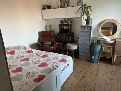 Coin salon dans l'établissement Charmante maison de campagne