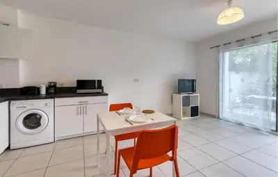 Cuisine ou kitchenette dans l'établissement Appartement Proche Plage
