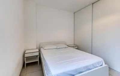Un ou plusieurs lits dans un hébergement de l'établissement Appartement Proche Plage