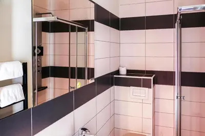 Salle de bains dans l'établissement Le Bois Vert