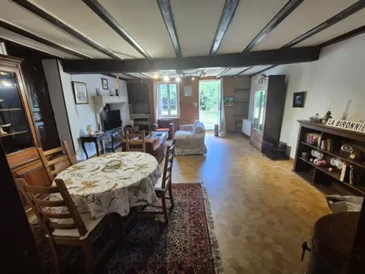 Restaurant ou autre lieu de restauration dans l'établissement Maison de campagne rustique et confortable