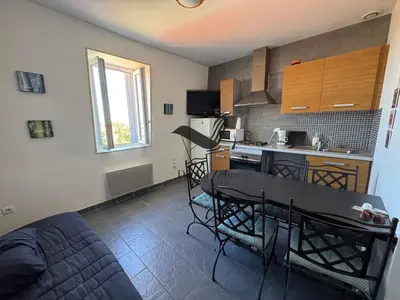Cuisine ou kitchenette dans l'établissement ARISTIDE 6 - Appartement idéalement situé