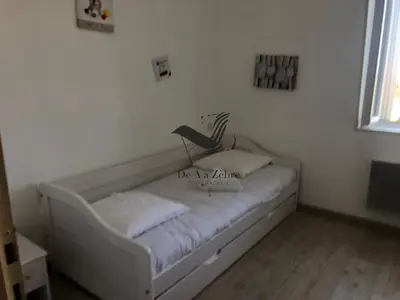 Un ou plusieurs lits dans un hébergement de l'établissement ARISTIDE 6 - Appartement idéalement situé