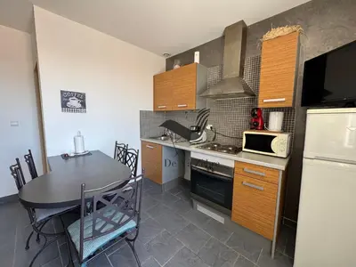 Cuisine ou kitchenette dans l'établissement ARISTIDE 7 - Appartement idéalement situé