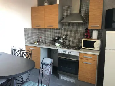 Cuisine ou kitchenette dans l'établissement ARISTIDE 7 - Appartement idéalement situé