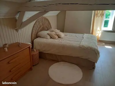 Un ou plusieurs lits dans un hébergement de l'établissement Gîte du vieux puits