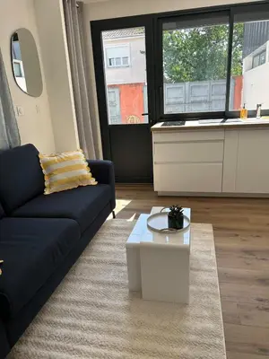 Coin salon dans l'établissement Studio calme avec terrasse proche centre-ville